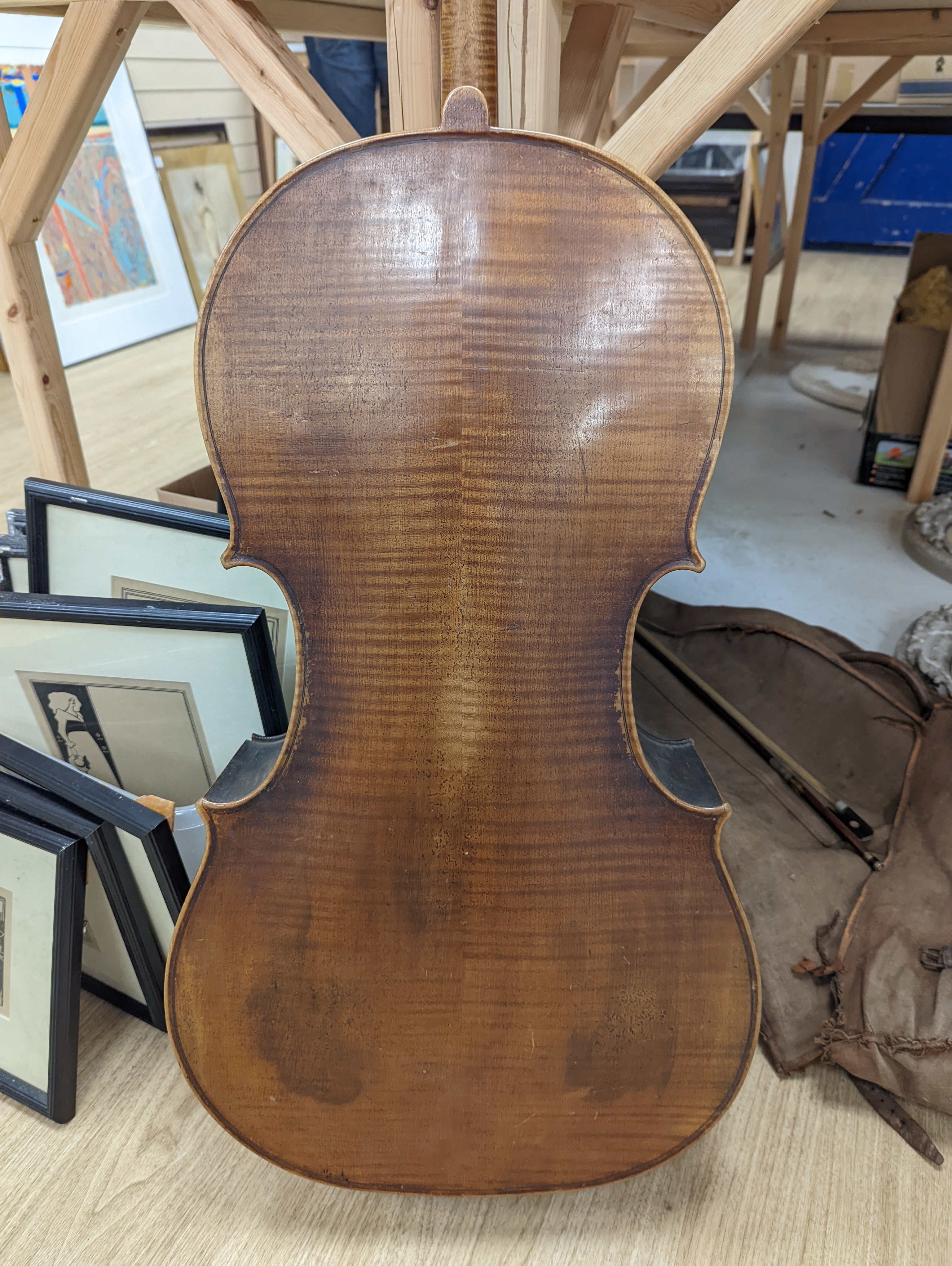 A late 19th century French cello, lob 75.5cm, canvas case with bow